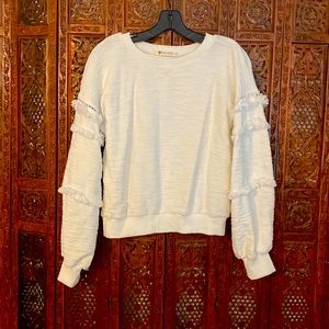 Off-white sweater with sleeve detail